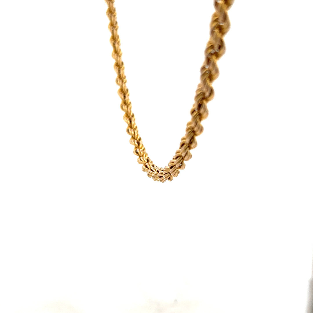 9ct yellow gold rope chain weighing 9.4g, featuring a classic twisted design and secure clasp, unbranded jewelry.