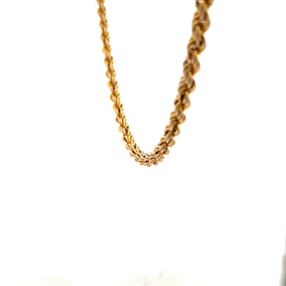 9ct yellow gold rope chain weighing 9.4g, featuring a classic twisted design and secure clasp, unbranded jewelry.