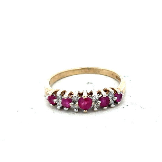 9ct yellow gold ruby and diamond ring in size J1/2, featuring a vibrant ruby and sparkling diamonds on an elegant band.