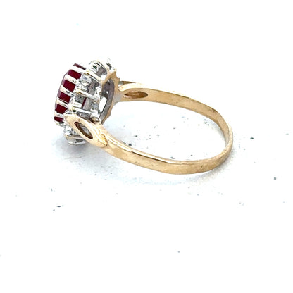 9ct yellow gold ruby and diamond ring in size L, featuring vibrant gemstones and elegant design.