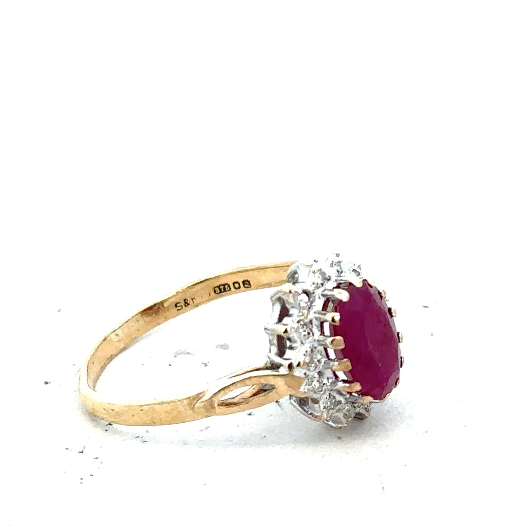 9ct yellow gold ruby and diamond ring in size L, featuring vibrant gemstones and elegant craftsmanship.