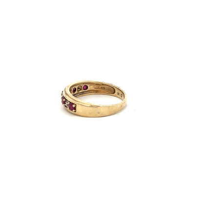 9ct yellow gold ruby and diamond ring in size M1/2, featuring a central ruby gemstone and diamond accents.