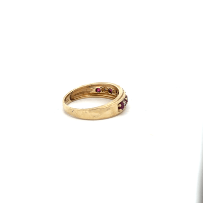 9ct yellow gold ruby and diamond ring in size M1/2, featuring a central ruby and sparkling diamonds, unbranded jewelry.
