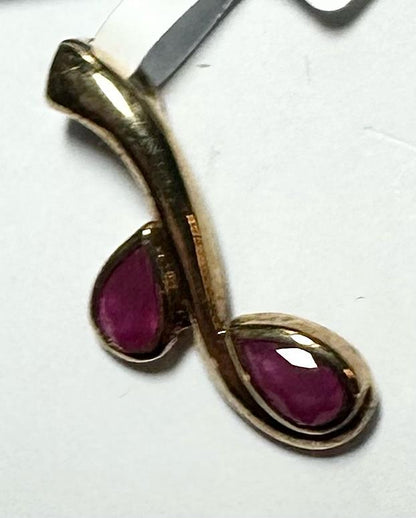 9ct yellow gold ruby pendant weighing 1.2g, featuring a vibrant ruby gemstone in a classic pendant design.