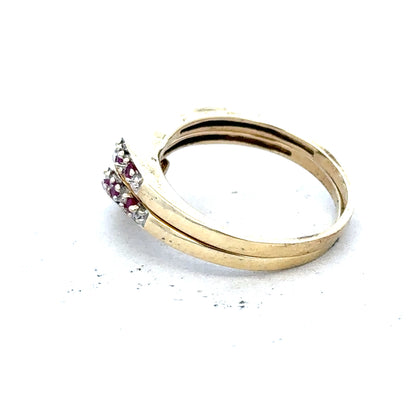 9ct yellow gold ruby ring in size O with a central ruby gemstone and a polished gold band.