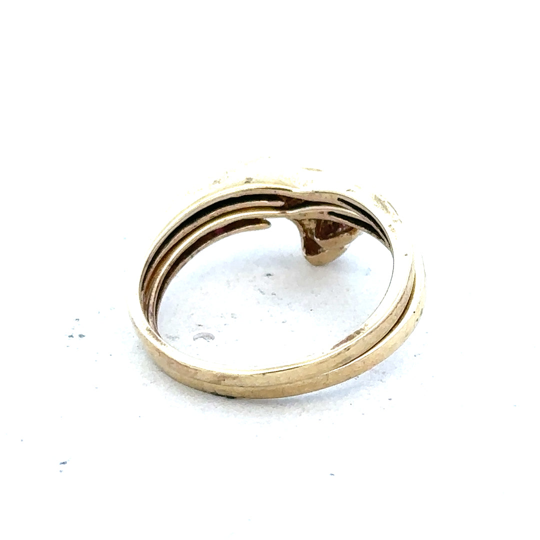 9ct yellow gold ruby ring in size O with a central ruby gemstone, displayed on a plain background.