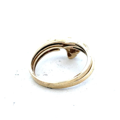 9ct yellow gold ruby ring in size O with a central ruby gemstone, displayed on a plain background.