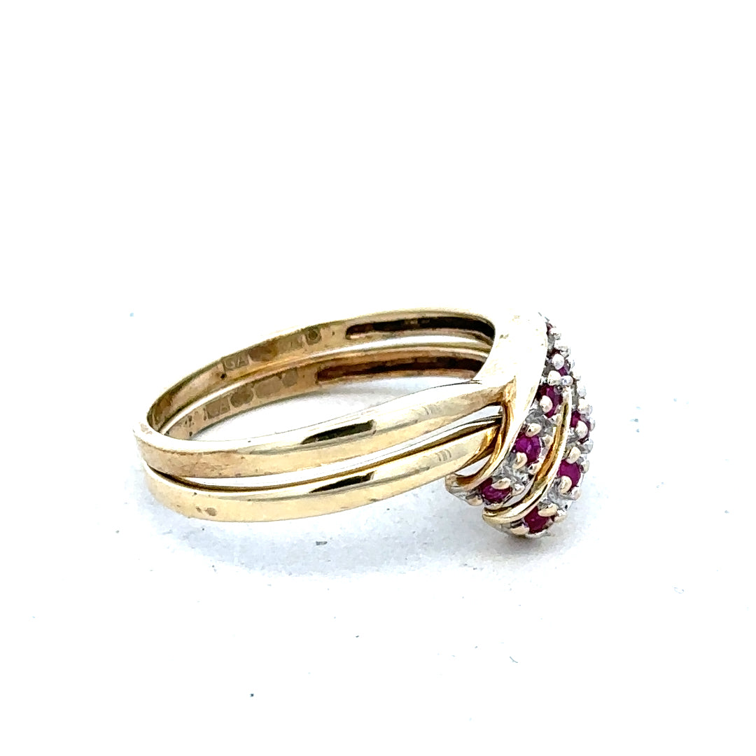 9ct yellow gold ruby ring in size O with a central ruby gemstone, featuring a sleek and elegant design.