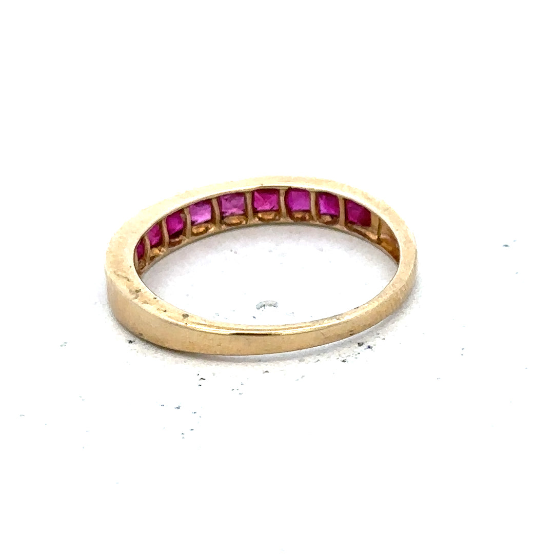 9ct yellow gold ruby ring in size P1/2, featuring a vibrant ruby gemstone set in a classic gold band.