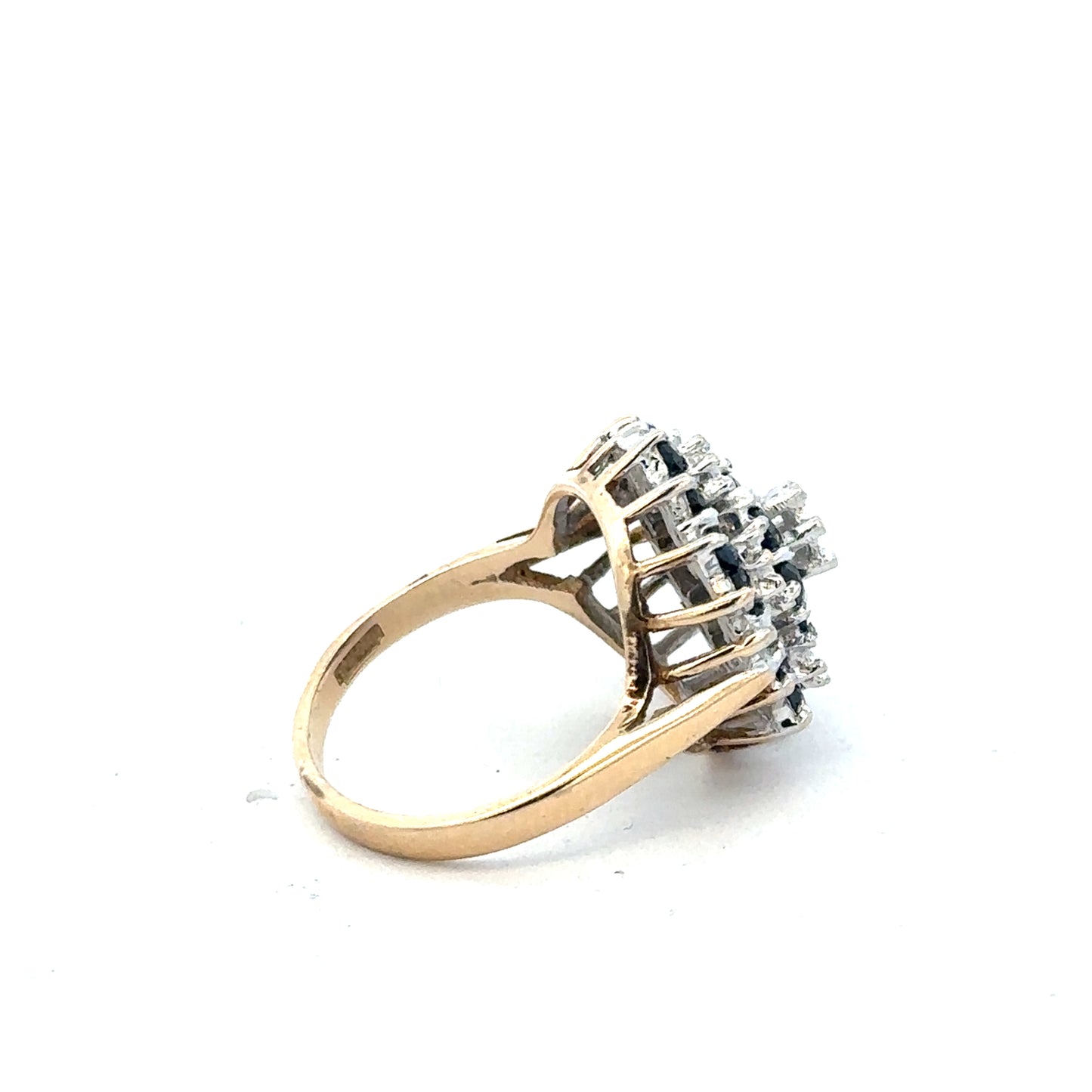 9ct yellow gold sapphire and diamond ring in size K, featuring a central sapphire with diamond accents, elegant jewelry design.