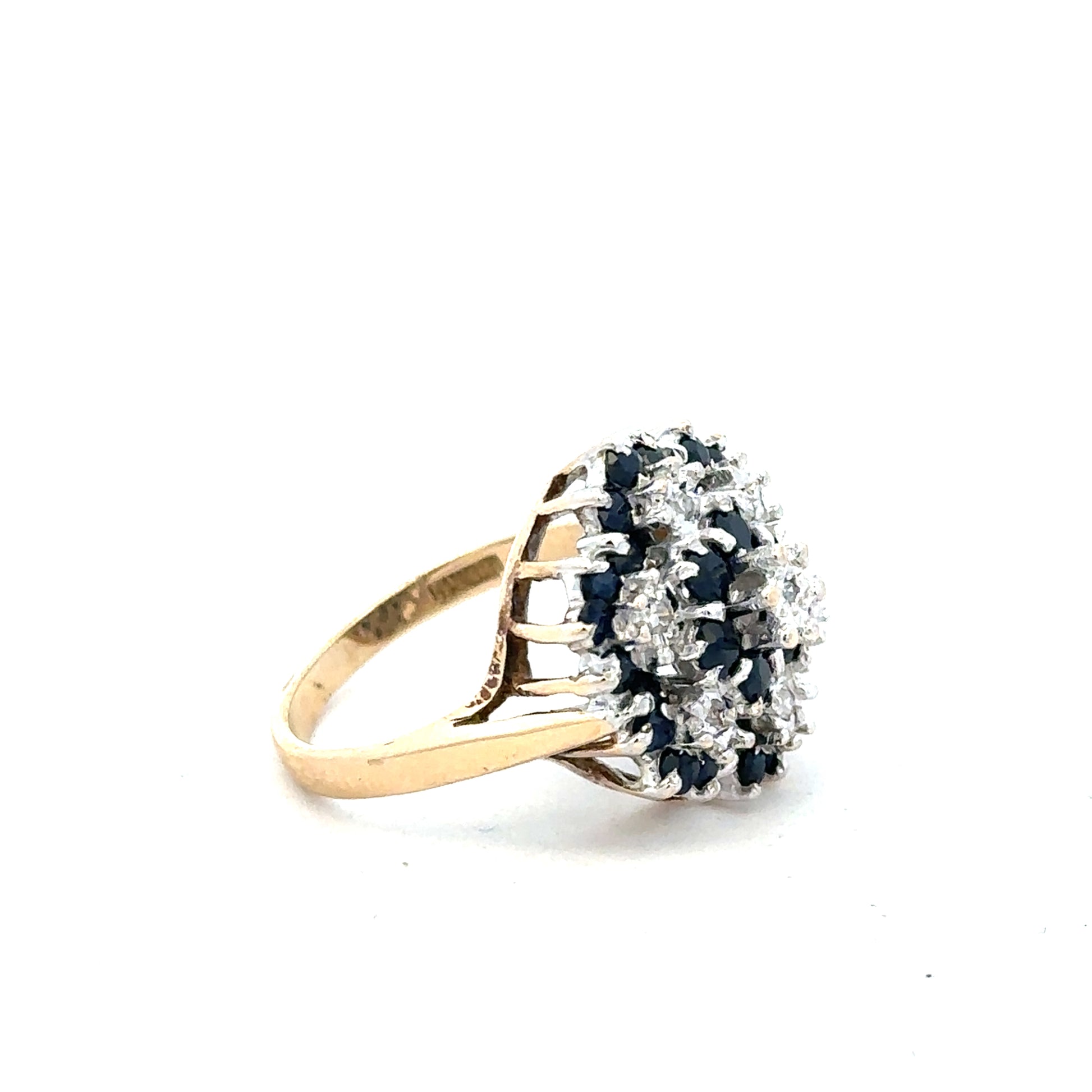 9ct yellow gold sapphire and diamond ring in size K, featuring a central sapphire surrounded by small diamonds.