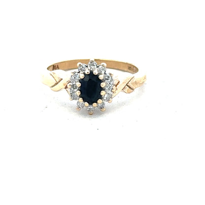9ct yellow gold sapphire and diamond ring in size K1/2, featuring a detailed design and sparkling gemstones.