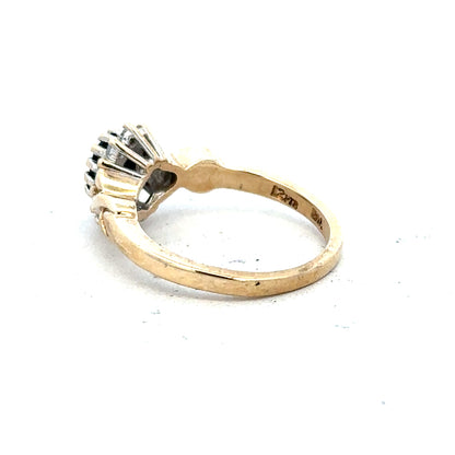 Gold sapphire and diamond ring in 9ct yellow gold, size K½, featuring a central sapphire and diamond accents.