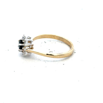9ct yellow gold sapphire and diamond ring, size L, featuring a central sapphire gemstone with surrounding diamonds.