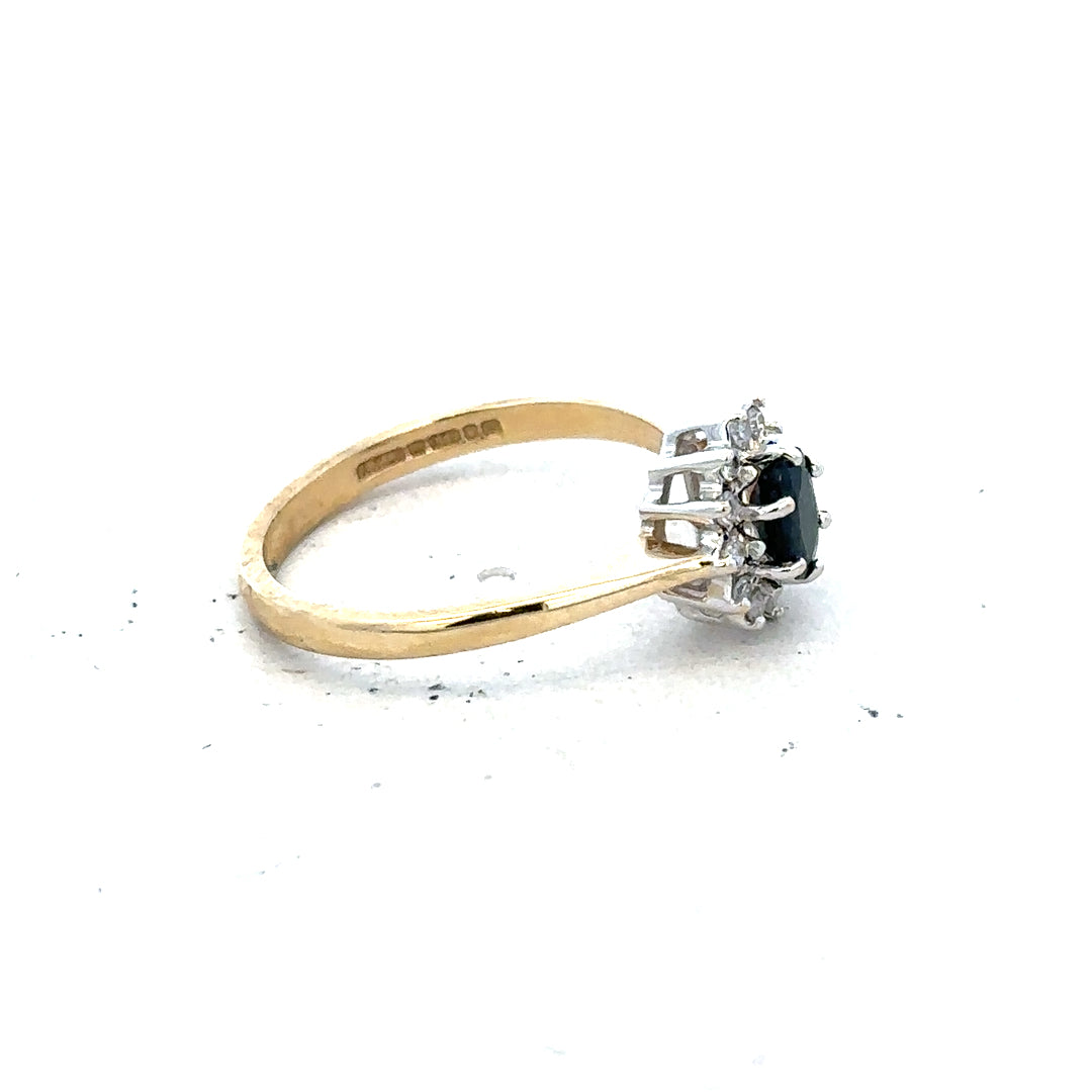 9ct yellow gold sapphire and diamond ring in size L, featuring a elegant gemstone design and sparkling accents.