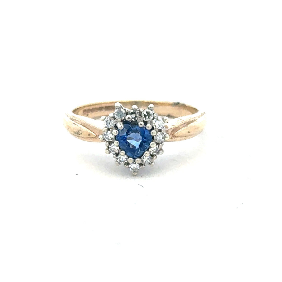 9ct yellow gold sapphire and diamond ring in size L1/2, featuring a detailed view of the elegant jewelry piece.