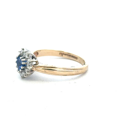 9ct yellow gold sapphire and diamond ring in size L1/2, featuring a vibrant blue sapphire and sparkling diamonds.