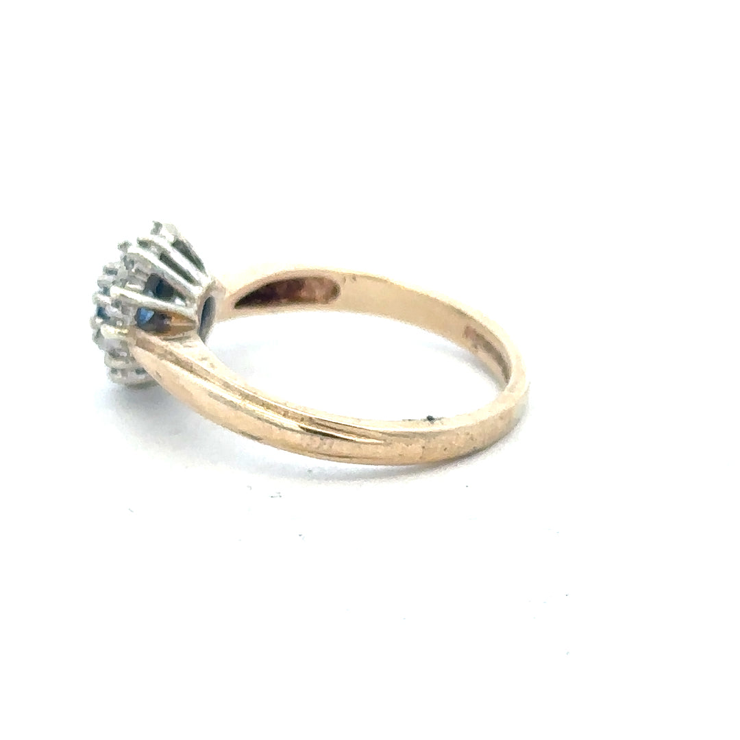 9ct yellow gold sapphire and diamond ring in size L1/2, featuring a vibrant sapphire centerpiece with sparkling diamonds.