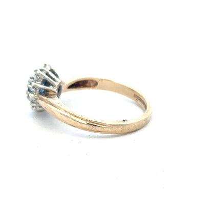 9ct yellow gold sapphire and diamond ring in size L1/2, featuring a vibrant sapphire centerpiece with sparkling diamonds.