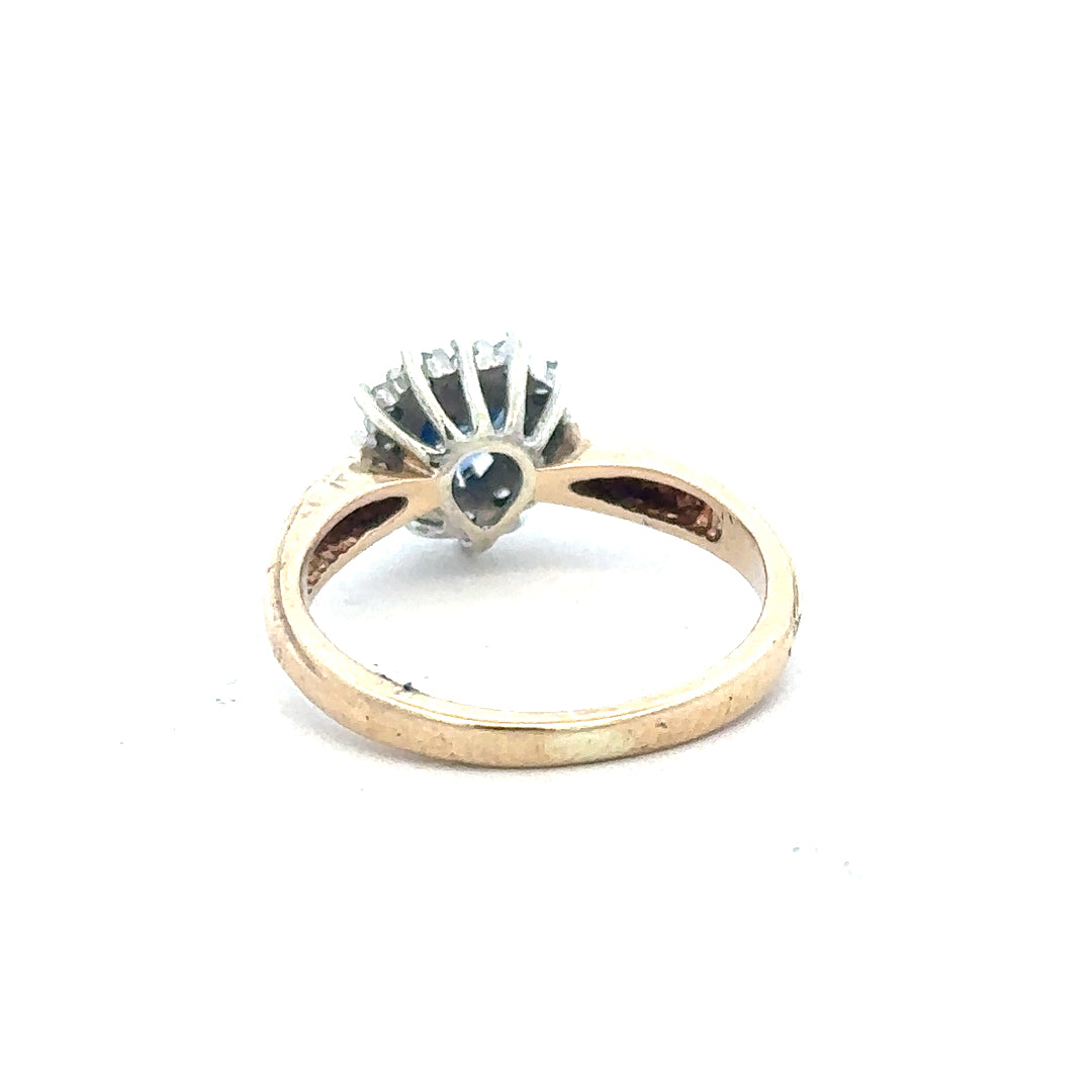 9ct yellow gold sapphire and diamond ring in size L 1/2, featuring a detailed design with sparkling gemstones.