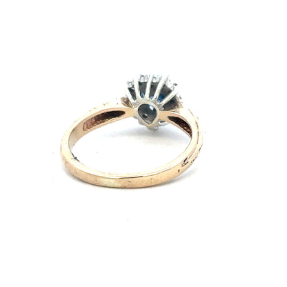 9ct yellow gold sapphire and diamond ring, size L1/2, featuring a polished band with a central sapphire and surrounding diamonds.