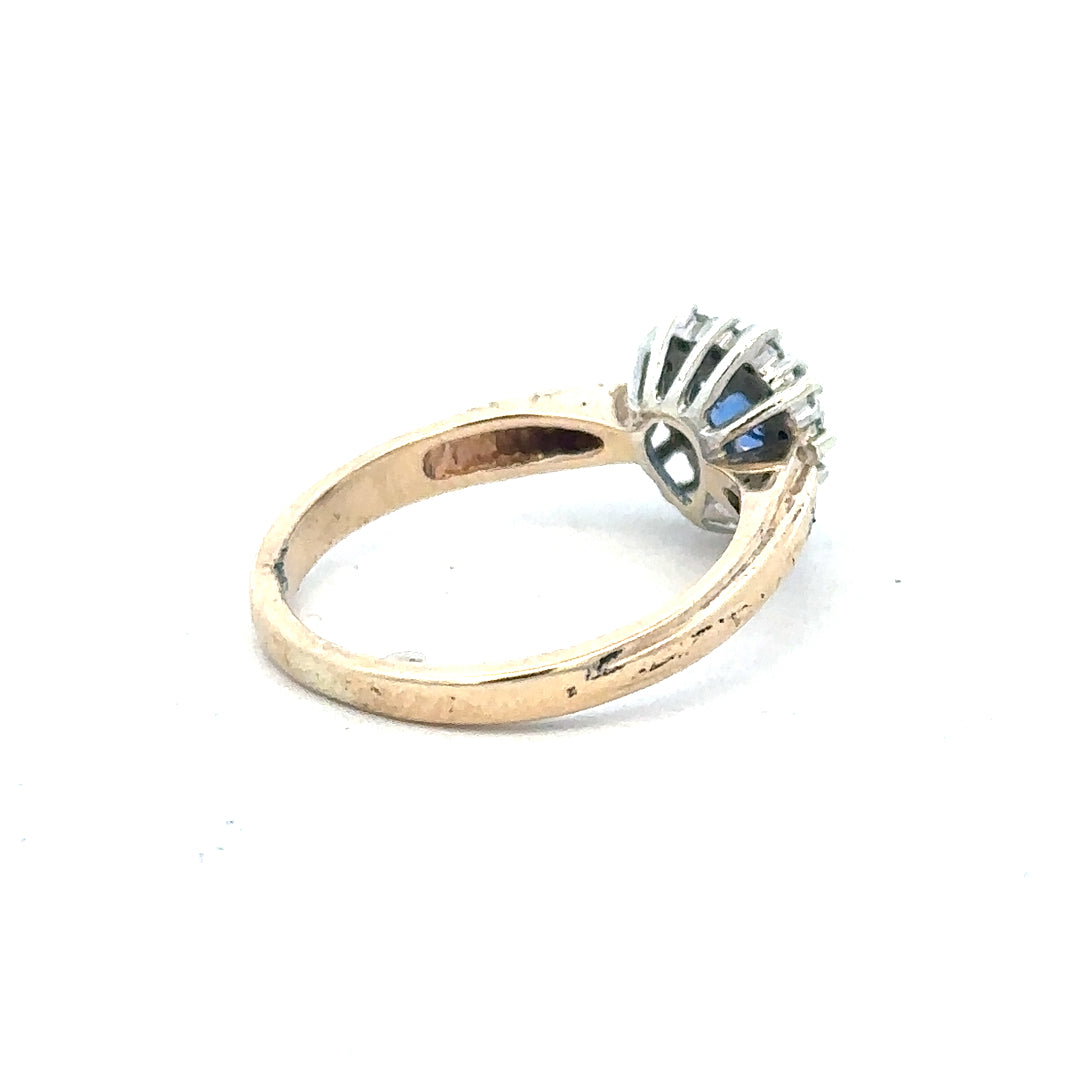 9ct yellow gold sapphire and diamond ring, size L1/2, featuring a vibrant sapphire centerpiece with sparkling diamonds.