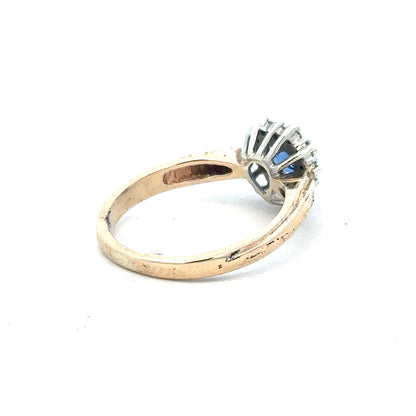 9ct yellow gold sapphire and diamond ring, size L1/2, featuring a vibrant sapphire centerpiece with sparkling diamonds.