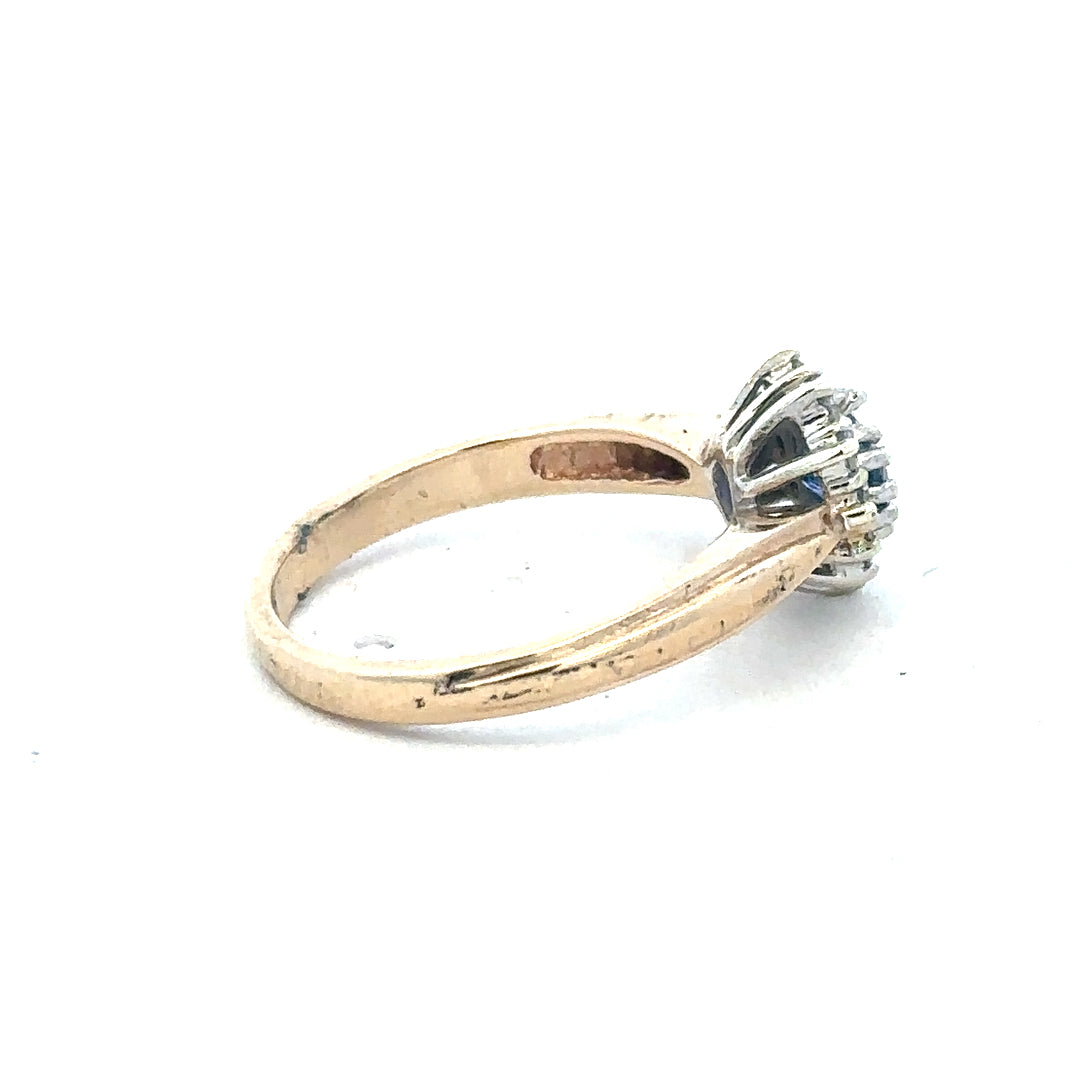 9ct yellow gold sapphire and diamond ring in size L1/2, featuring a central sapphire surrounded by sparkling diamonds.