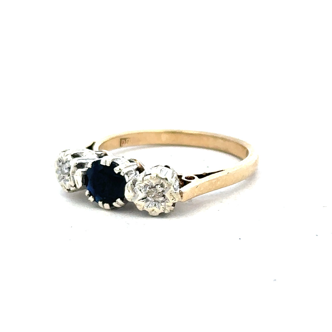 9ct yellow gold sapphire and diamond ring in size L1/2, featuring a vibrant sapphire centerpiece with sparkling diamonds.