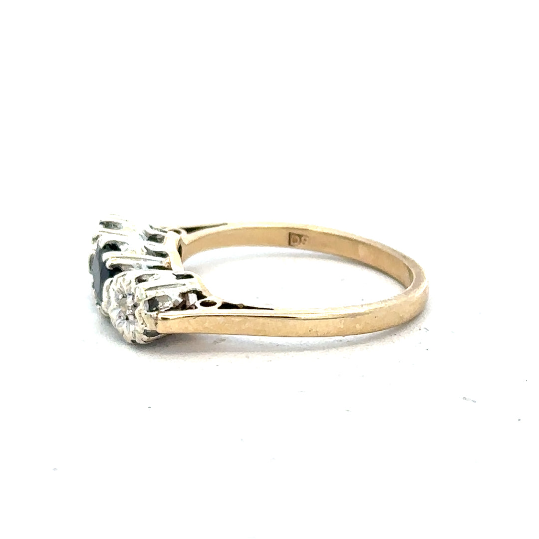 9ct yellow gold sapphire and diamond ring in size L1/2, featuring a vibrant sapphire centerpiece and sparkling diamonds.
