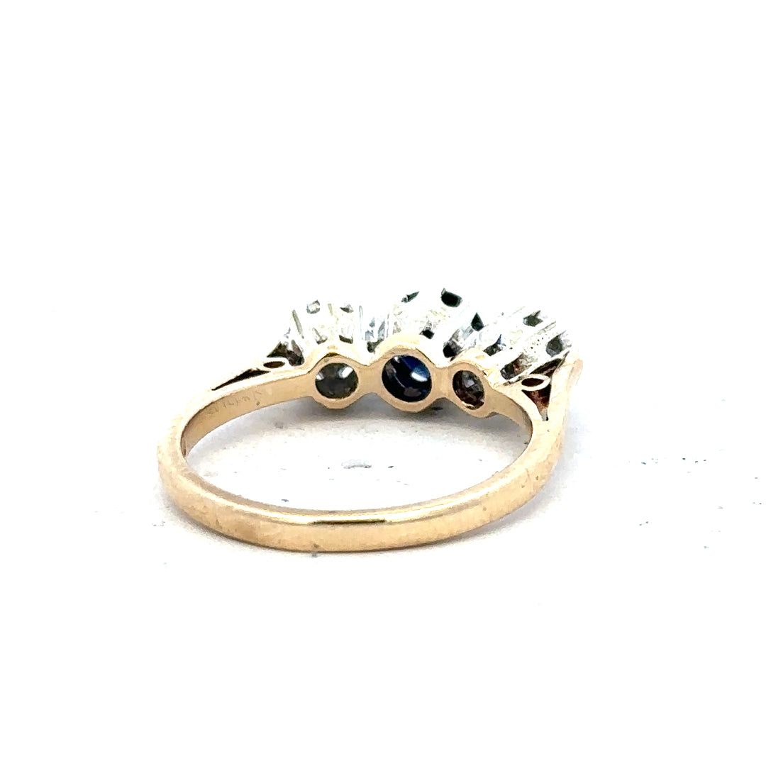 9ct yellow gold sapphire and diamond ring in size L1/2, featuring a detailed design and sparkling gemstones.