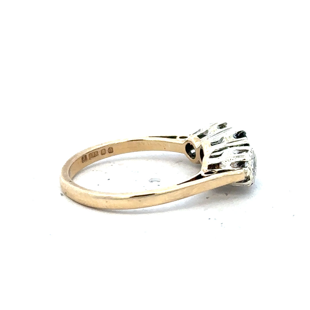9ct yellow gold sapphire and diamond ring in size L1/2, featuring a sparkling gemstone and elegant design.
