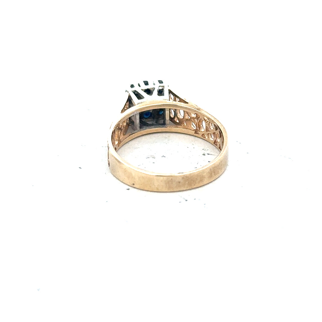 9ct yellow gold sapphire and diamond ring, size N1/2, featuring a vibrant blue sapphire and sparkling diamonds.