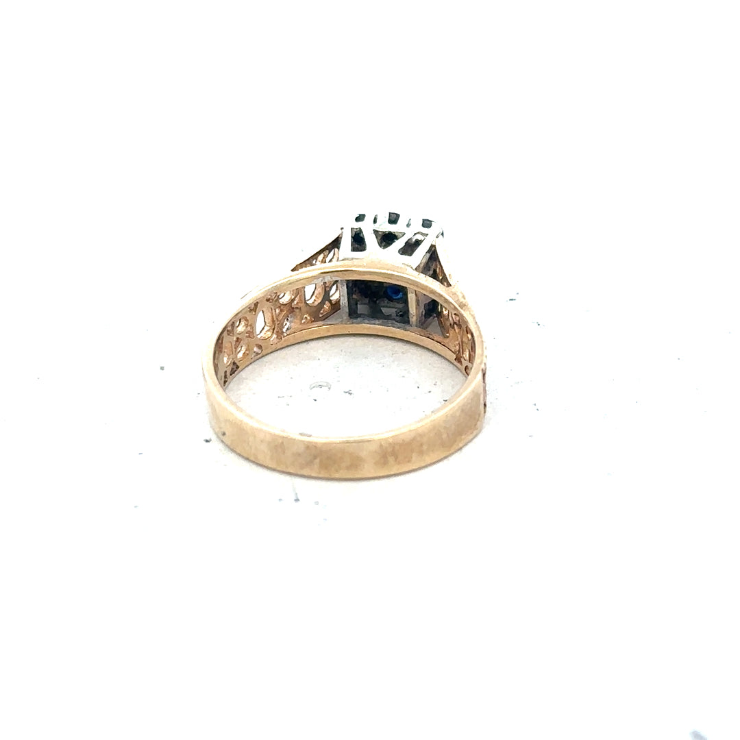 Yellow gold sapphire and diamond ring, size N 1/2, featuring sparkling gemstones and intricate design.