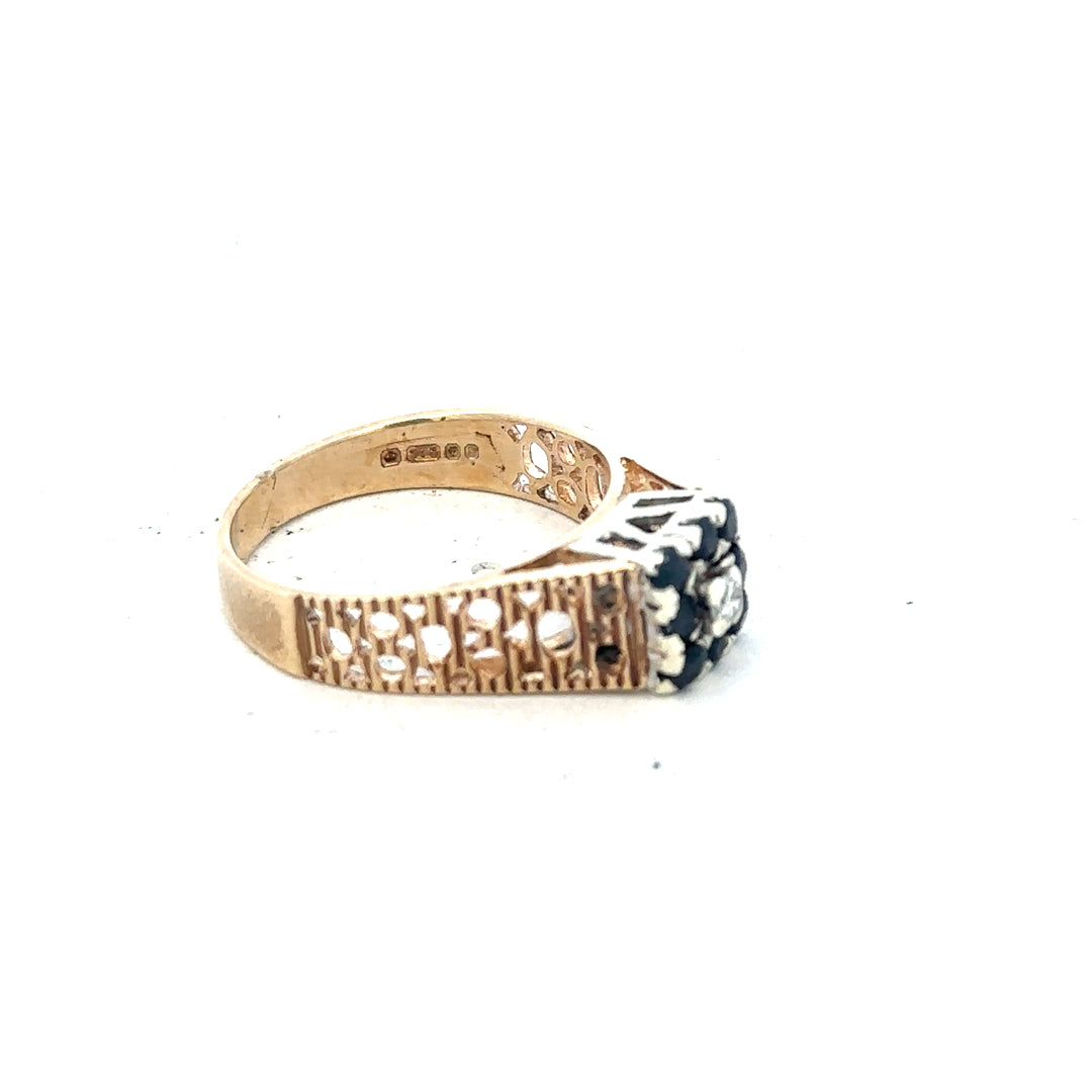 9ct yellow gold sapphire and diamond ring in size N½, featuring a central sapphire with diamond accents, elegant jewelry piece.