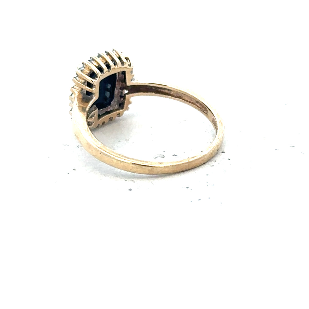 9ct yellow gold sapphire and diamond ring in size O, featuring a detailed design with sparkling gemstones.