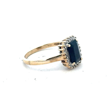 9ct yellow gold sapphire and diamond ring in size O, featuring a sparkling gemstone and elegant design.