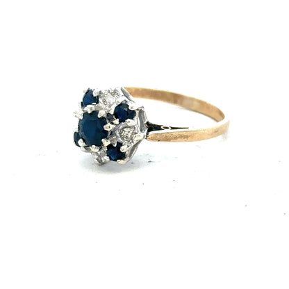 9ct yellow gold sapphire and diamond ring, size P, featuring a central sapphire stone with diamond accents.
