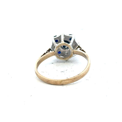 9ct yellow gold sapphire and diamond ring in size P, featuring a detailed design with sparkling gemstones.