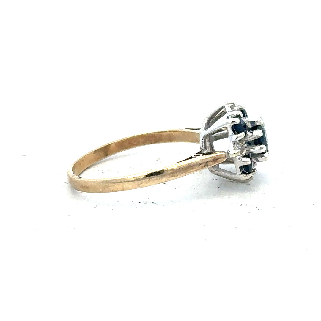 9ct yellow gold sapphire and diamond ring in size P, featuring a classic design with sparkling gemstones.