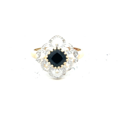 9ct yellow gold sapphire and diamond ring, size P, featuring a central sapphire gemstone and sparkling diamonds.