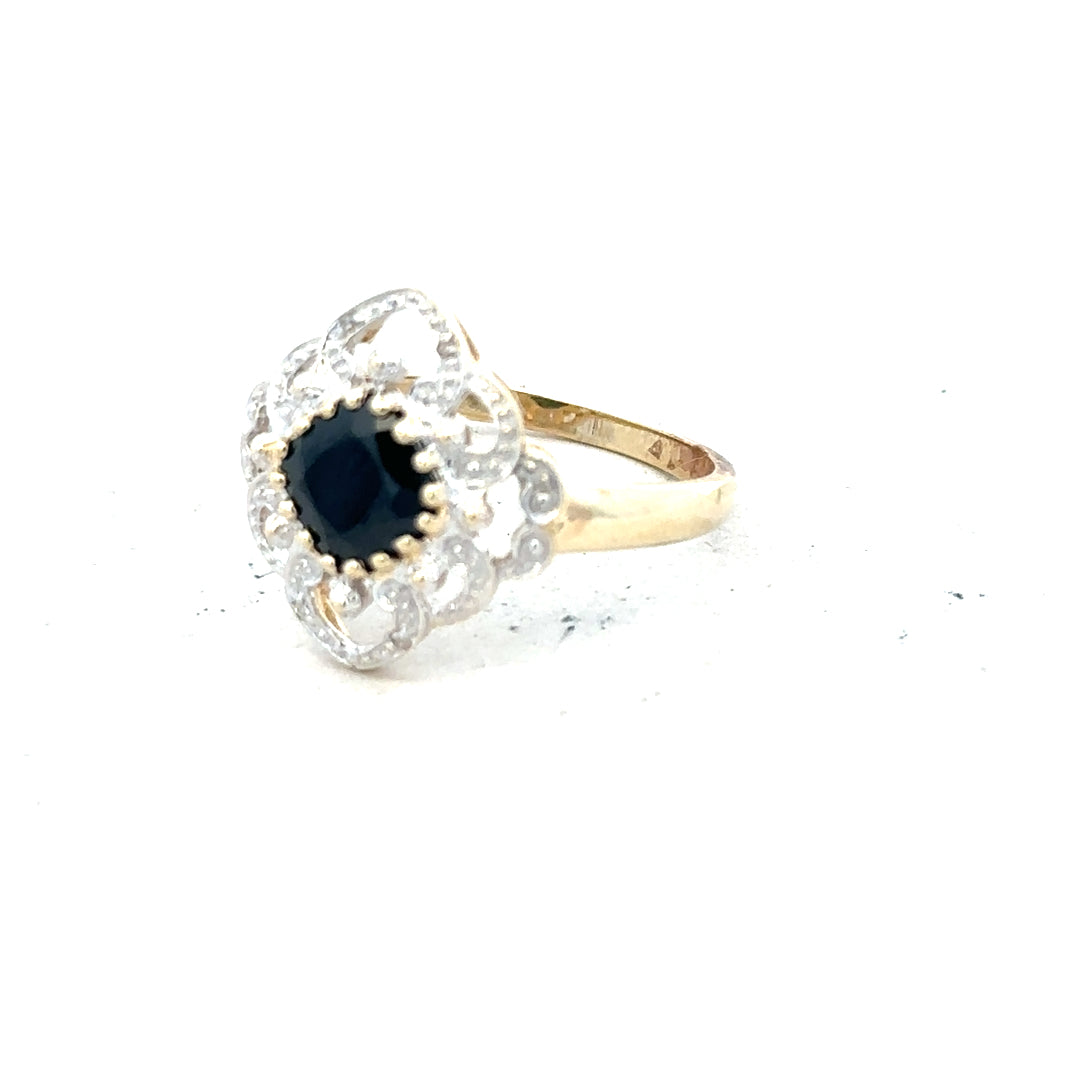 9ct yellow gold sapphire and diamond ring in size P, featuring a detailed close-up of the elegant jewelry.