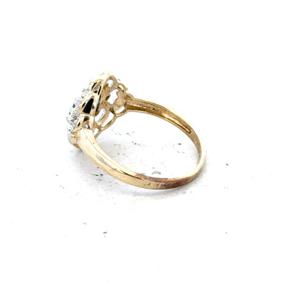 9ct yellow gold sapphire and diamond ring, size P, featuring a central sapphire gemstone with surrounding diamonds.