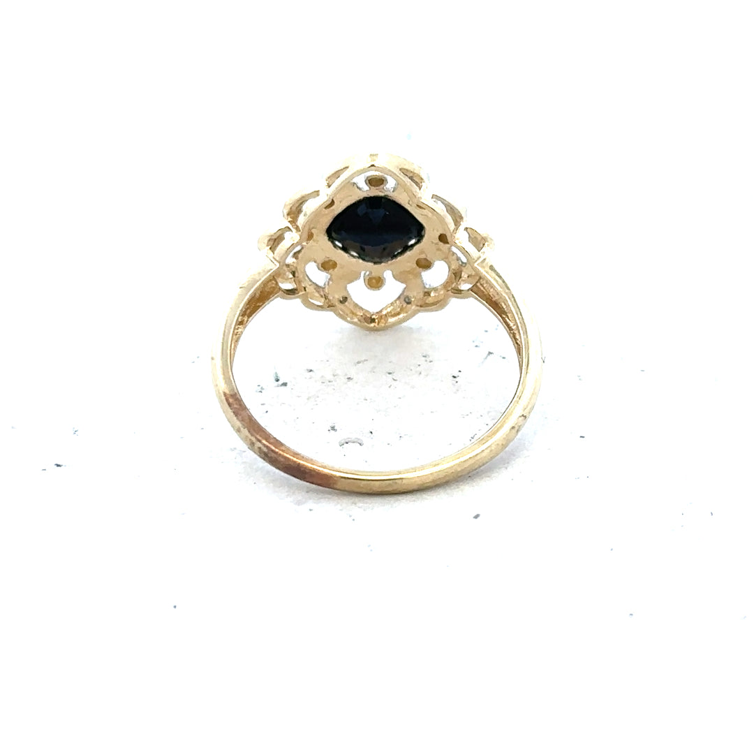9ct yellow gold sapphire and diamond ring, size P, featuring a central sapphire and sparkling diamonds on an elegant band.