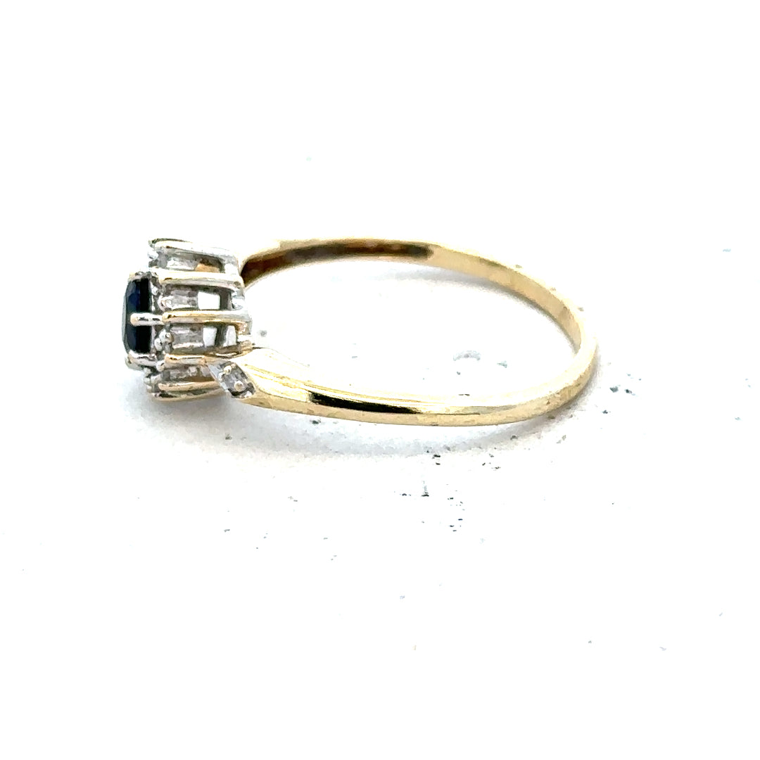 9ct yellow gold sapphire and diamond ring in size P, featuring a sparkling gemstone and elegant design.