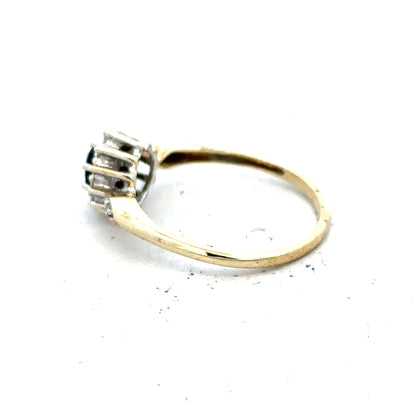 9ct yellow gold sapphire and diamond ring, size P, featuring a central sapphire surrounded by diamonds, elegant jewelry piece.