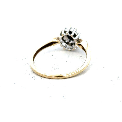 9ct yellow gold sapphire and diamond ring, size P, featuring a central blue sapphire and sparkling diamonds.