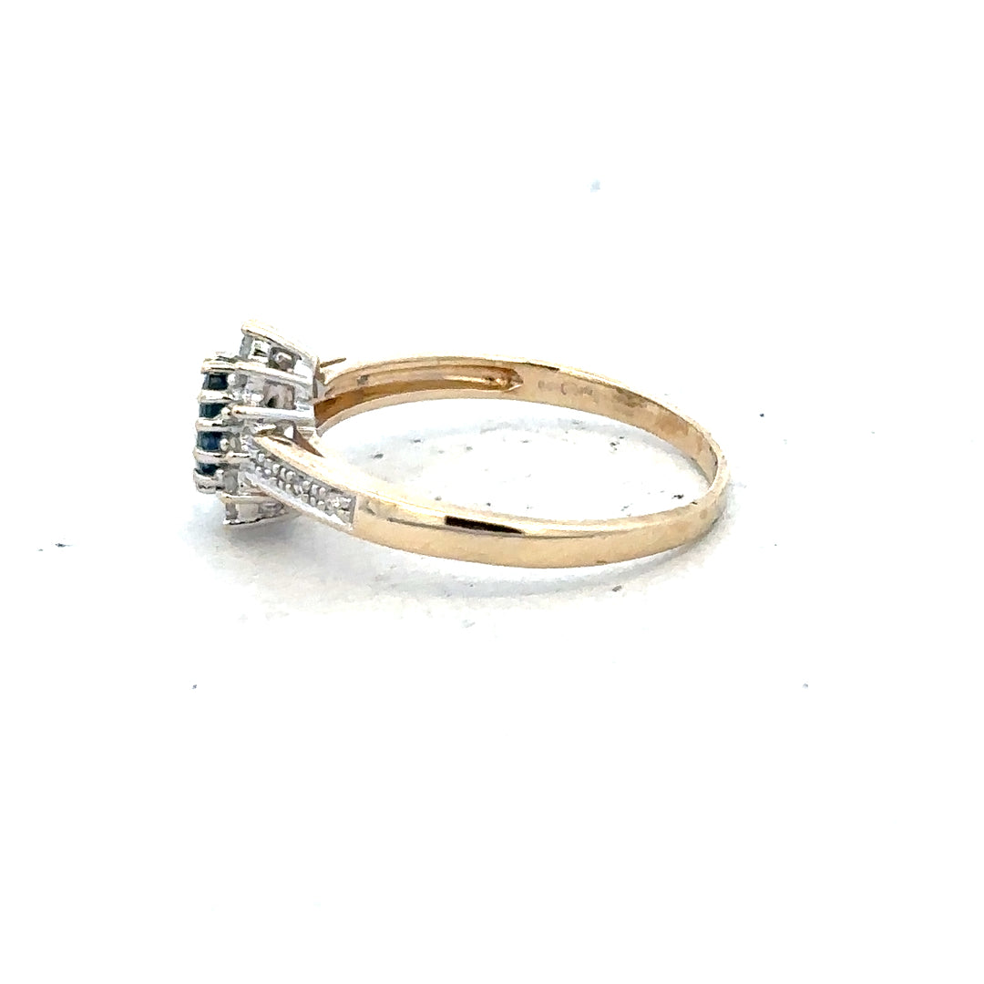 9ct yellow gold sapphire and diamond ring, size P 1/2, featuring a vibrant sapphire centerpiece with sparkling diamonds.