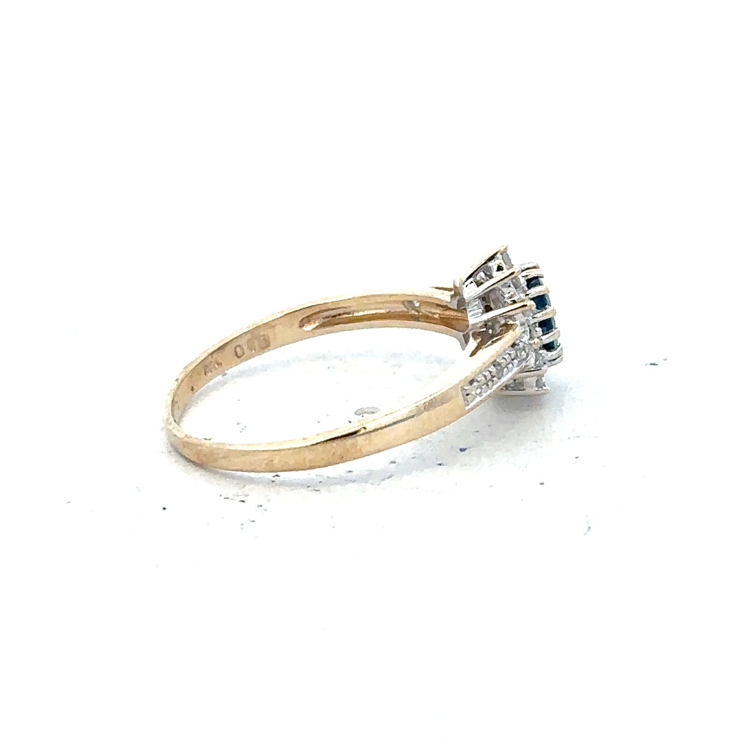 9ct yellow gold sapphire and diamond ring in size P 1/2, featuring a detailed design with sparkling gemstones.