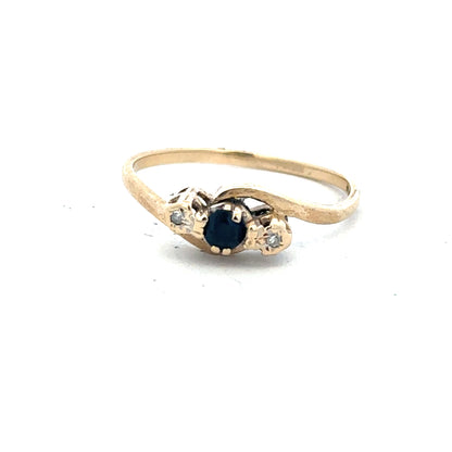 9ct yellow gold sapphire and diamond ring in size Q, featuring a central sapphire with diamond accents.